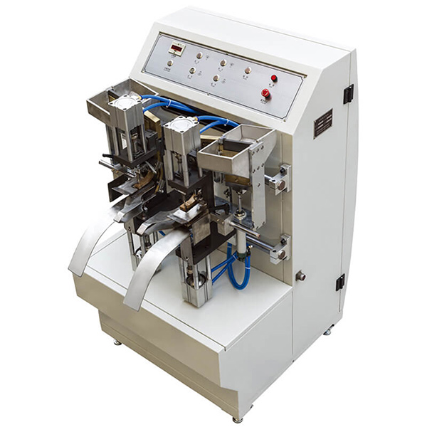 RS-A Четырехголовочная машина для изготовления проушин для бумажных пакетов